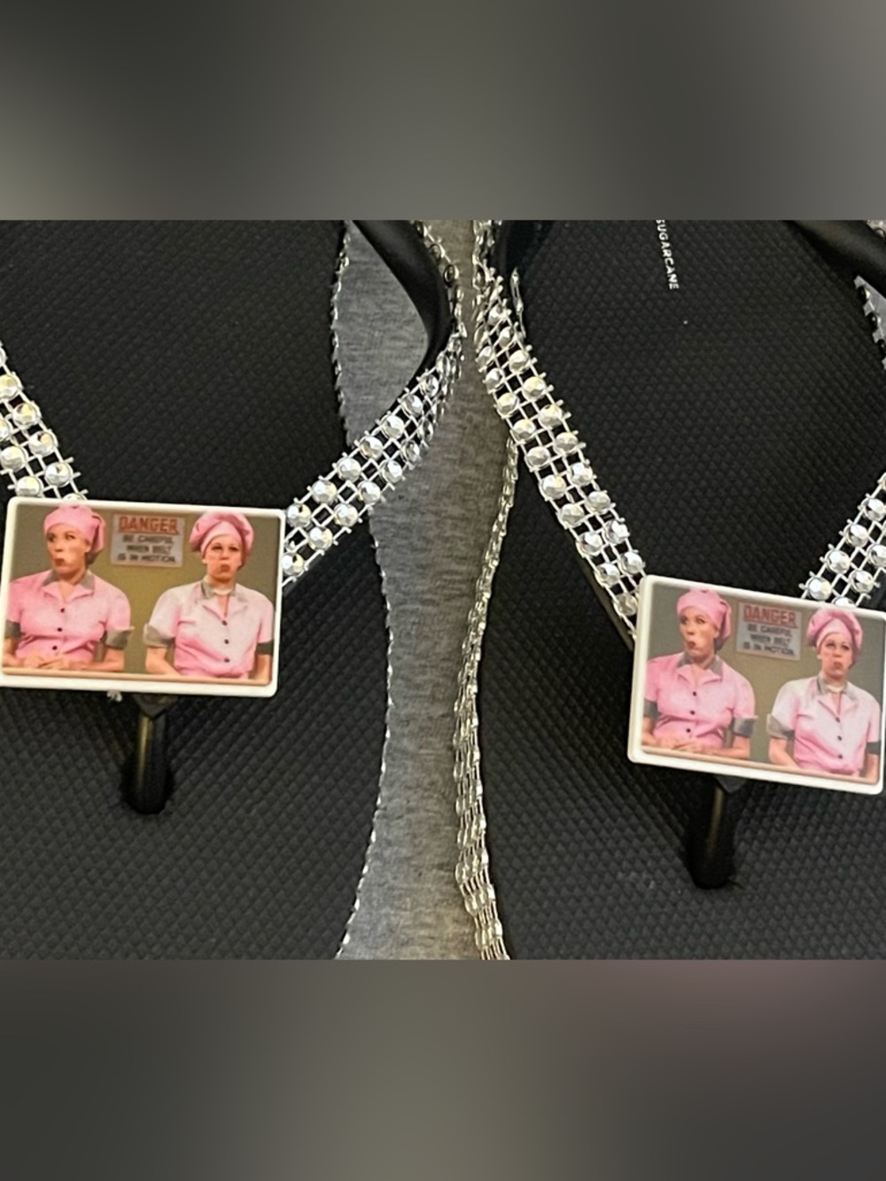 Women’s Black Rhinestone Flip Flop Sandals with Pink Accent Charm